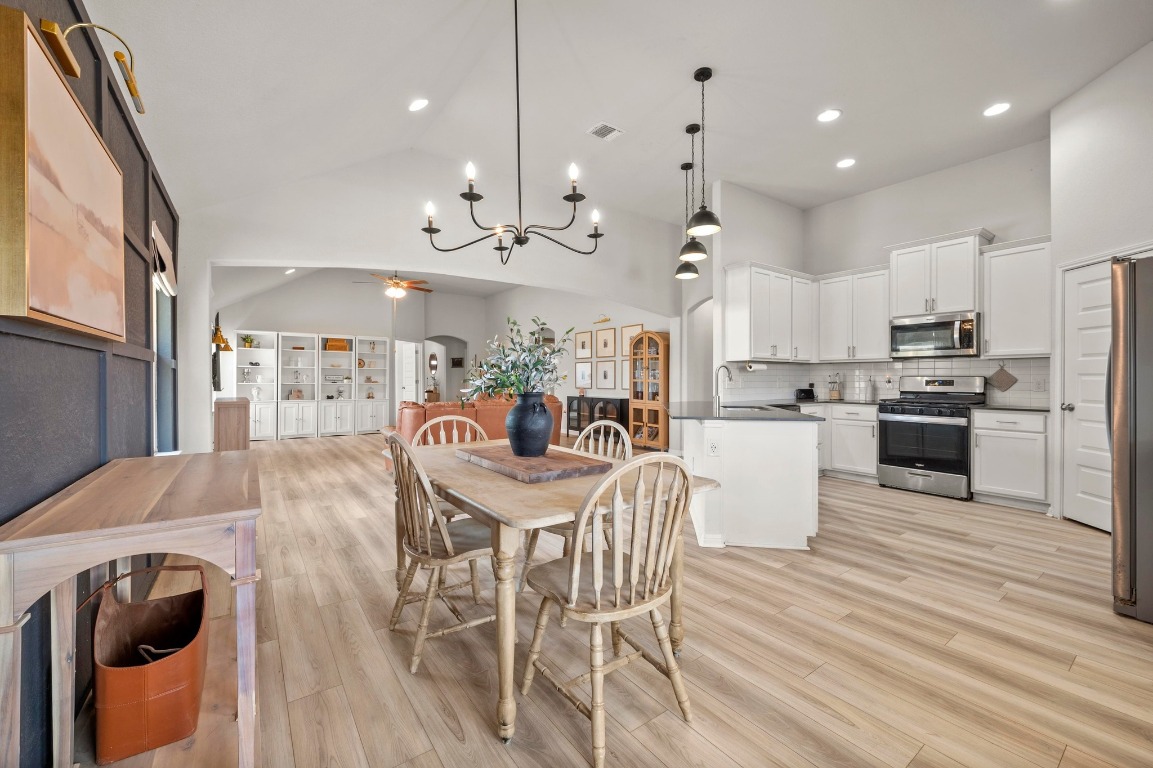 352 Backstays Loop Kyle, TX 78640 - Photo 12 of 39 a view of a kitchen and dining room
