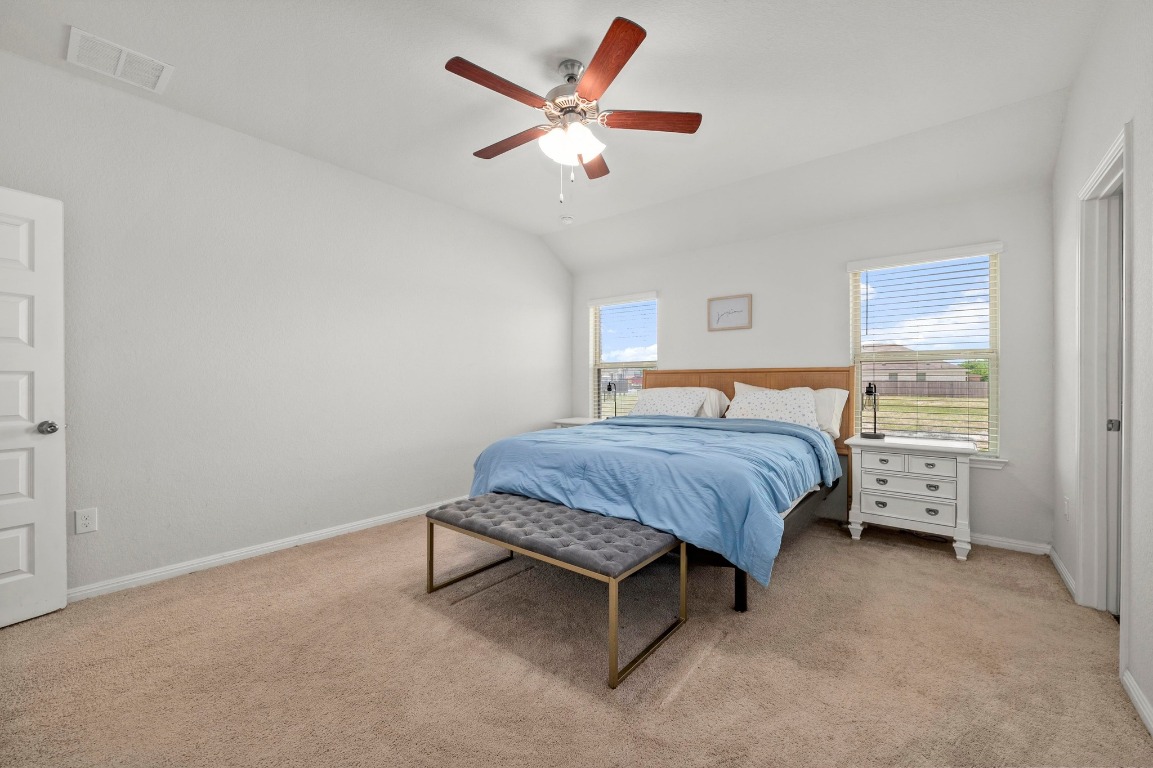 352 Backstays Loop Kyle, TX 78640 - Photo 17 of 39 a bedroom with a bed and window