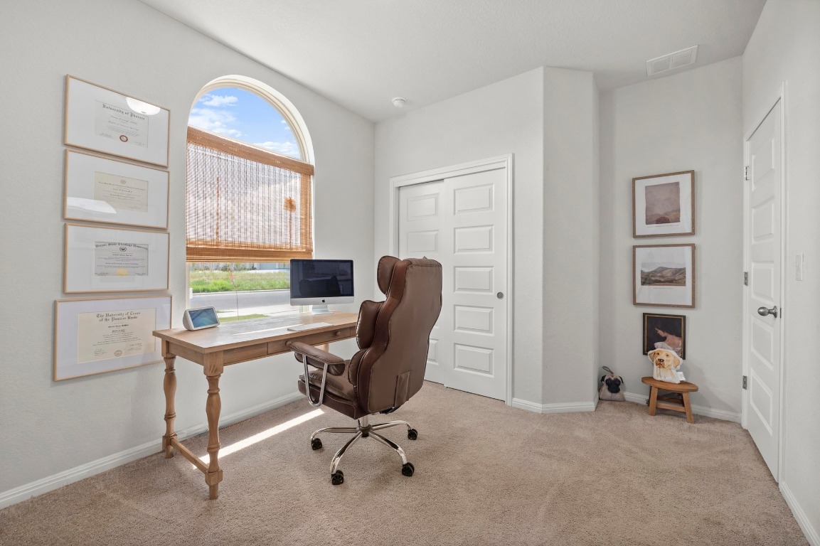 352 Backstays Loop Kyle, TX 78640 - Photo 21 of 39 a view of a workspace with furniture and a window