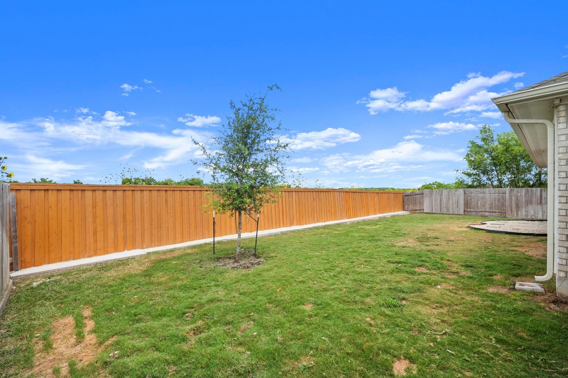 352 Backstays Loop Kyle, TX 78640 - Photo 29 of 39 a view of yard with swimming pool and green space