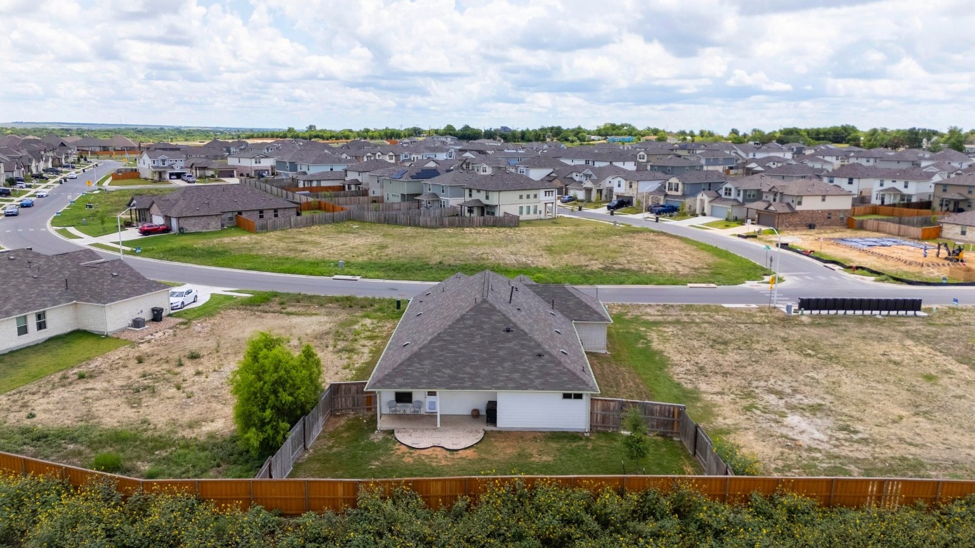 352 Backstays Loop Kyle, TX 78640 - Photo 33 of 39 an aerial view of a house with a garden