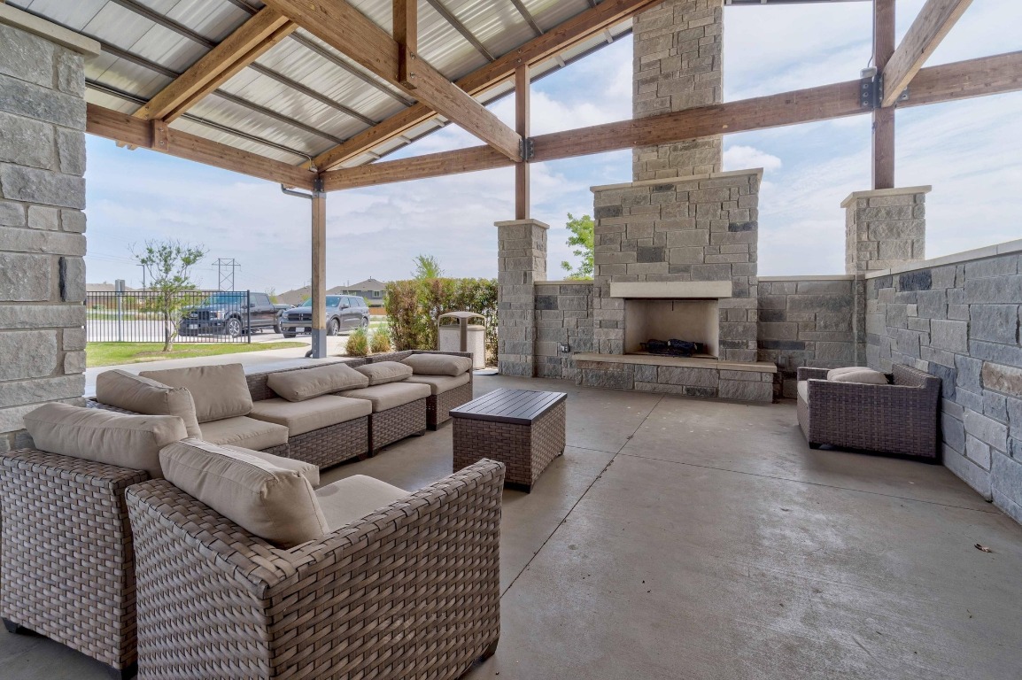 352 Backstays Loop Kyle, TX 78640 - Photo 36 of 39 a living room with furniture and a fireplace