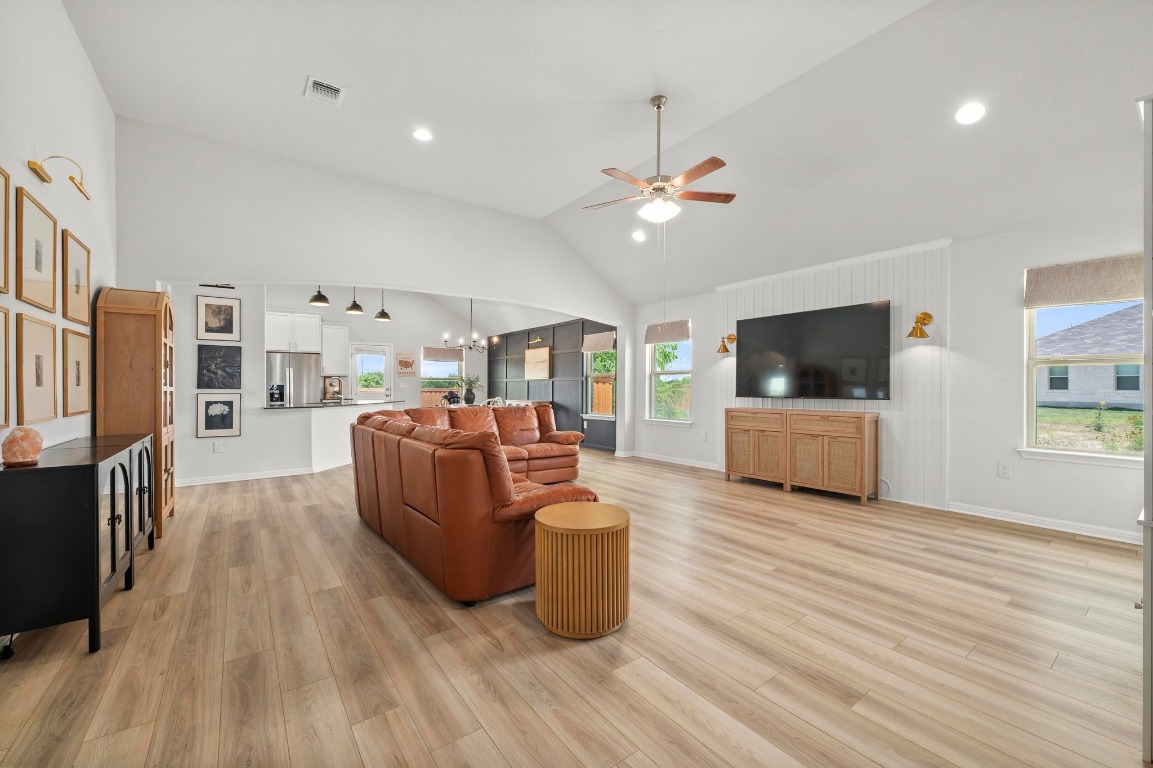 352 Backstays Loop Kyle, TX 78640 - Photo 5 of 39 a living room with furniture and a flat screen tv