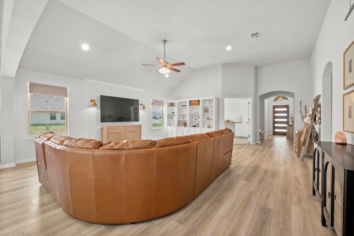 352 Backstays Loop Kyle, TX 78640 - Photo 6 of 39 a living room with furniture and a flat screen tv