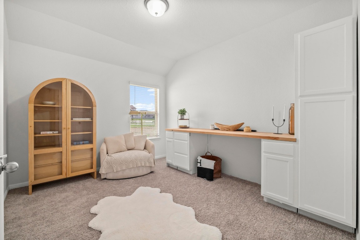 352 Backstays Loop Kyle, TX 78640 - Photo 7 of 39 a living room with furniture and a window