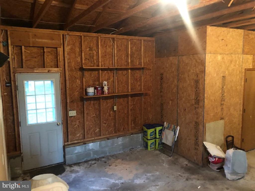 306 Walt Messick Road Harrington, DE 19952 - Photo 20 of 20 Garage additional storage & access to back yard