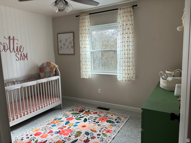 1324 West Raintree Drive, Unit 44 Price, UT 84501 - Photo 6 of 25 Room with a ceiling fan, a window, and light gray wall paint