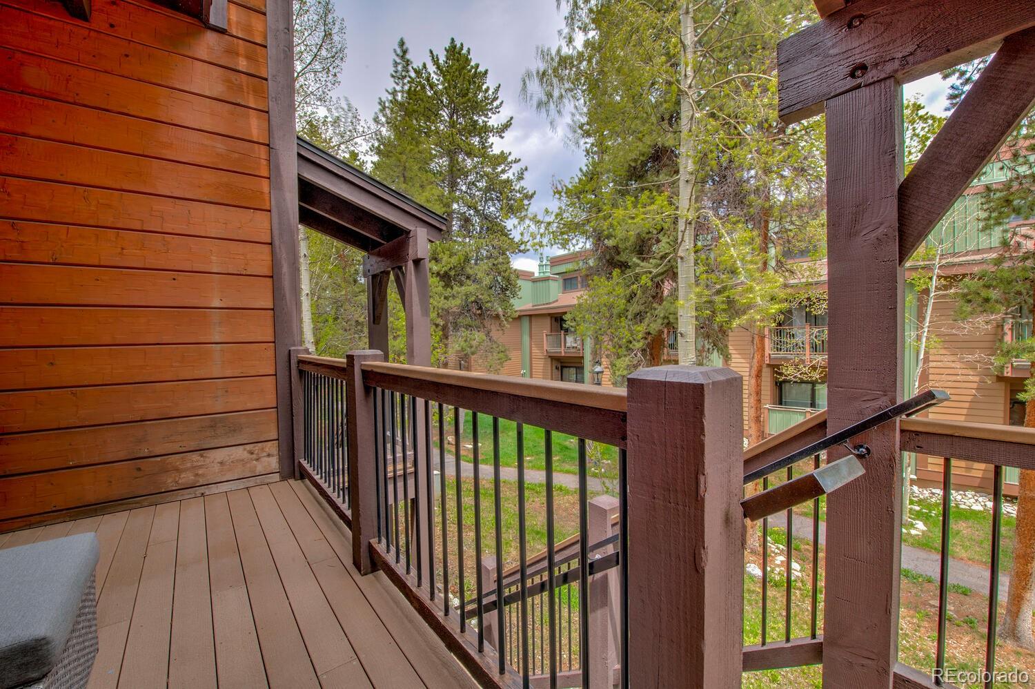200 Primrose Path, Unit 11 Breckenridge, CO 80424 - Photo 22 of 32 a view of balcony with wooden floor and fence