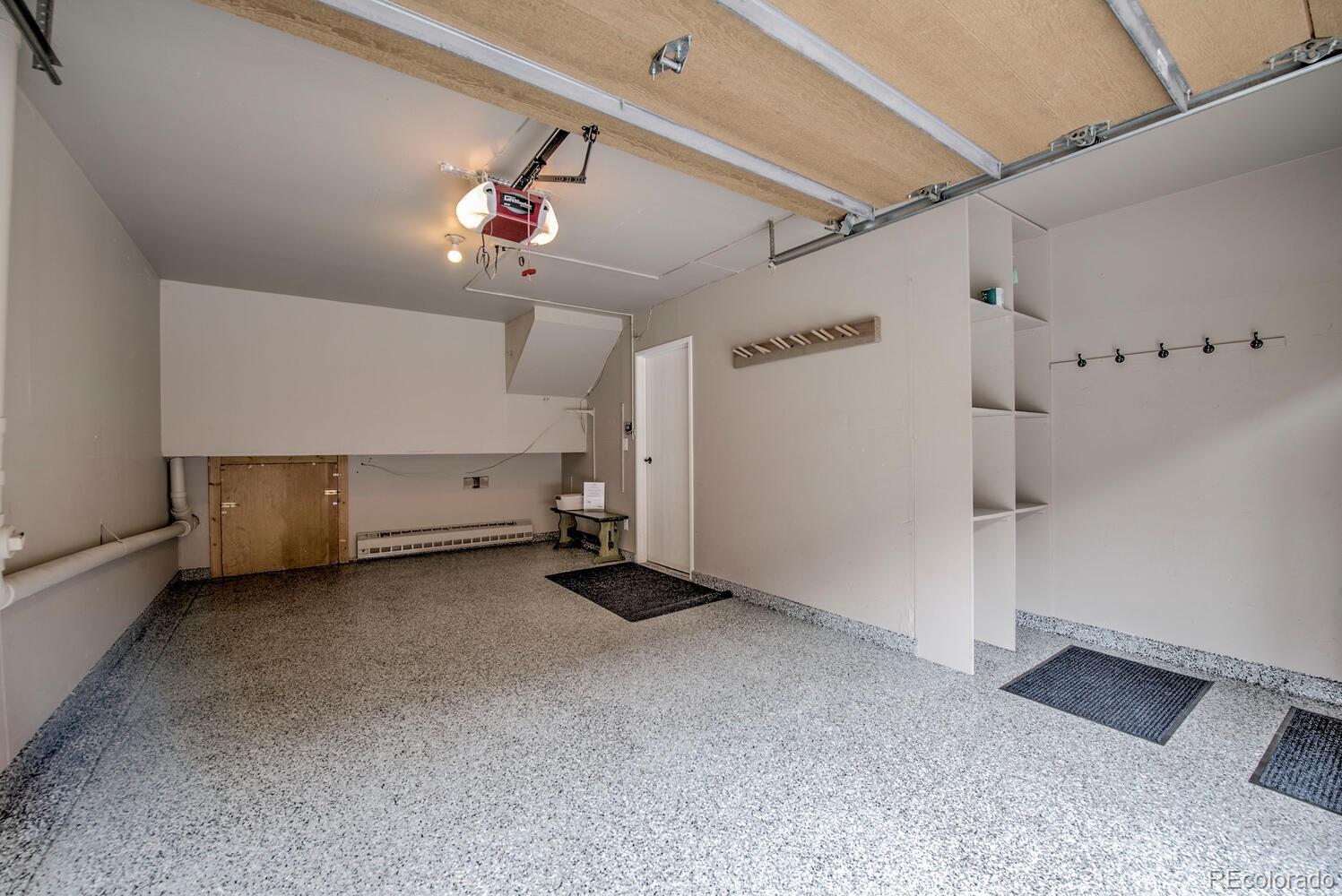 200 Primrose Path, Unit 11 Breckenridge, CO 80424 - Photo 26 of 32 an empty room with ceiling fan and window