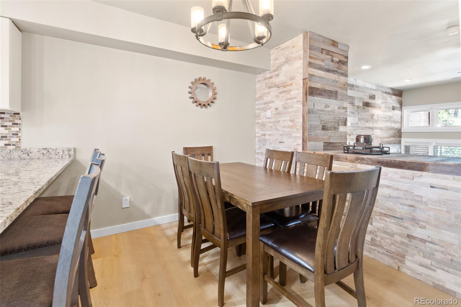 200 Primrose Path, Unit 11 Breckenridge, CO 80424 - Photo 6 of 32 a view of a dining room with furniture and chandelier