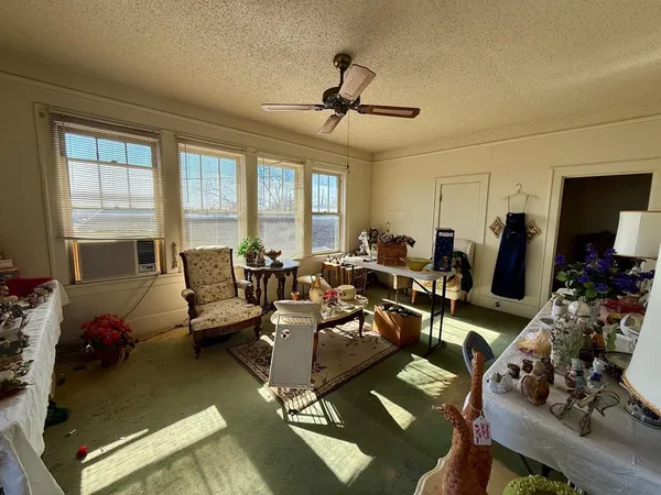 a kitchen with a sink cabinets and window