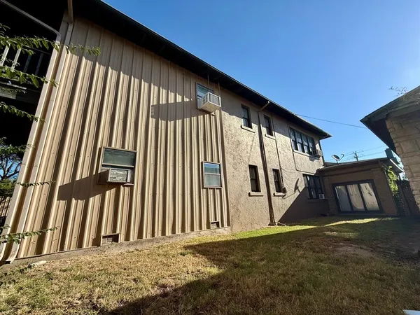 a view of a back yard of the house