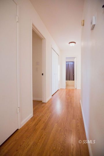 2007 Pickrell Street Ridgecrest, CA 93555 - Photo 21 of 37 a view of hallway with wooden floor