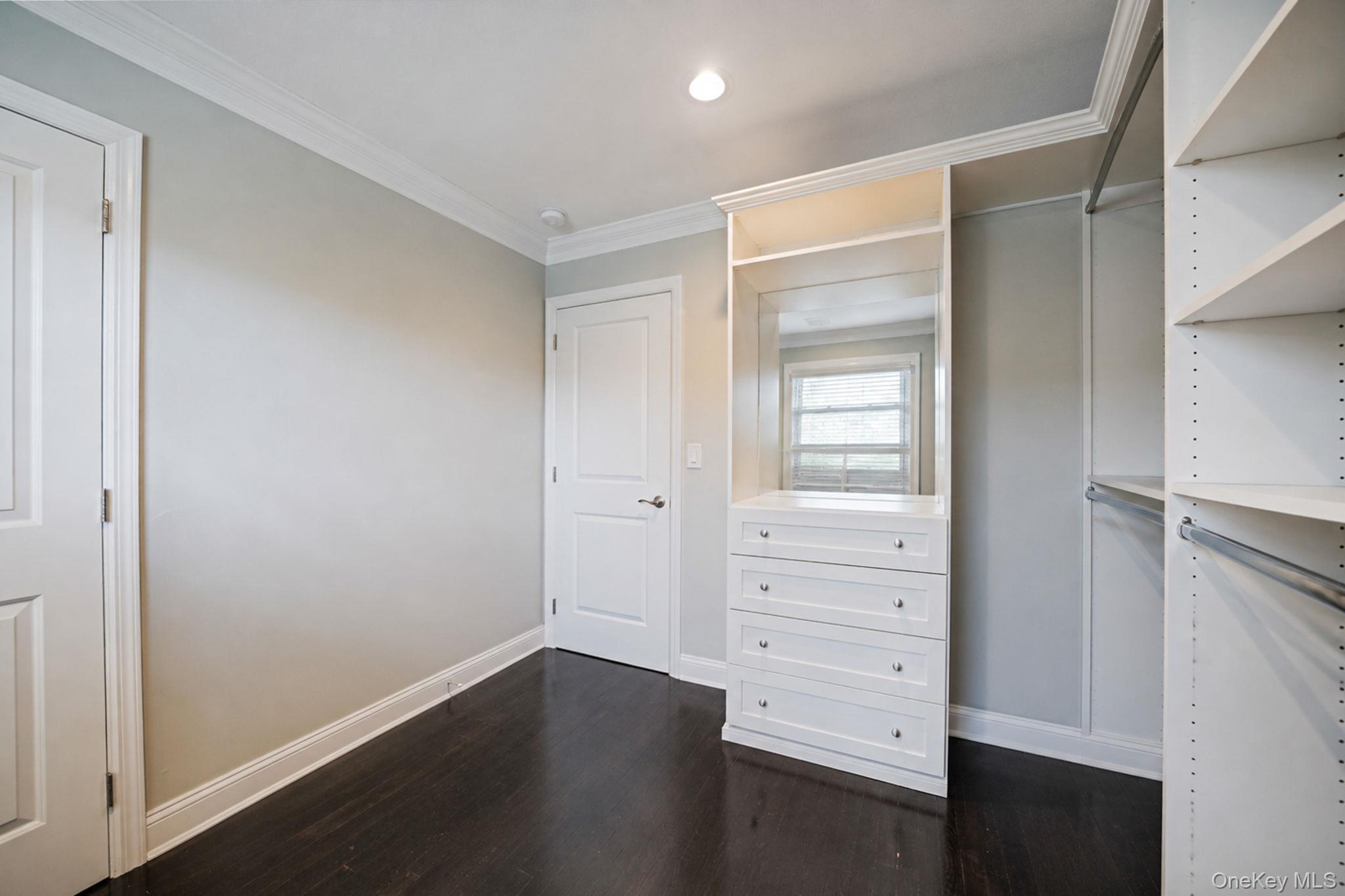 110 Stephen Road Bayport, NY 11705 - Photo 25 of 39 a view of walk in closet with empty racks