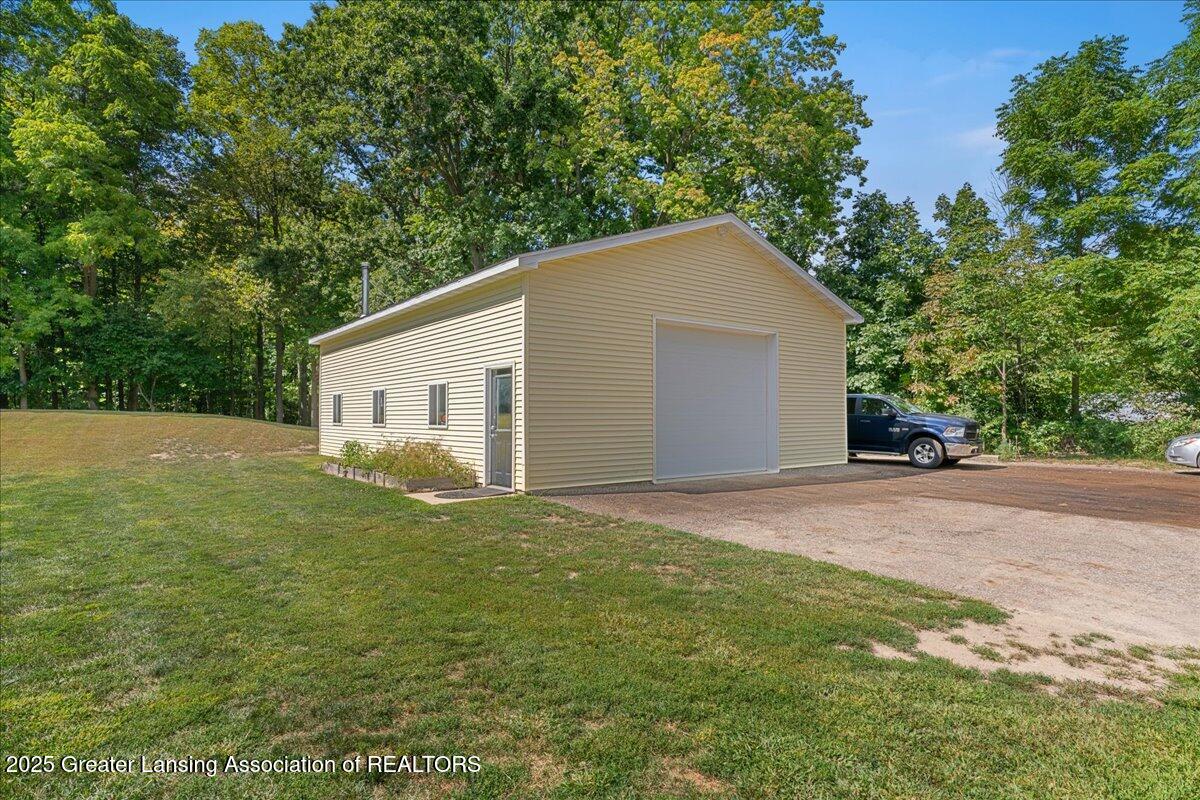 243 North Aurelius Road Mason, MI 48854 - Photo 4 of 49 11-Media Jett - 53
