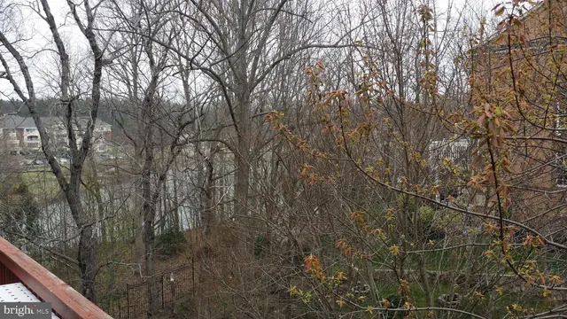 a view of a yard from a balcony