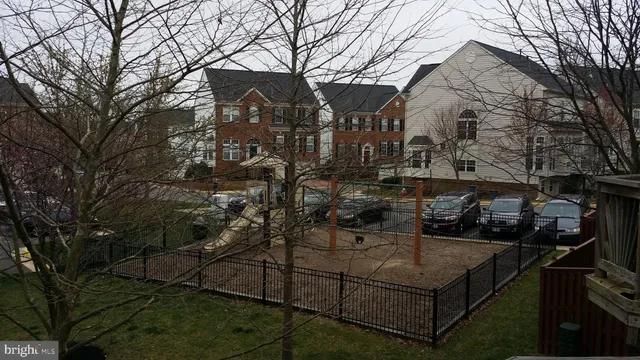 a view of a backyard of the house