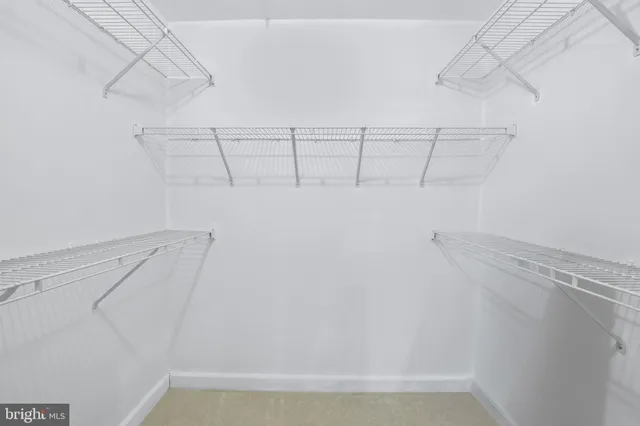 a bathroom with a tub a sink and a shower