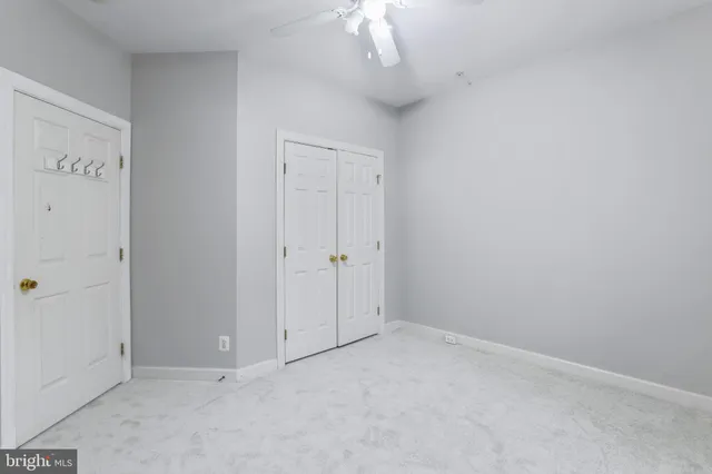 an empty room with a bathroom