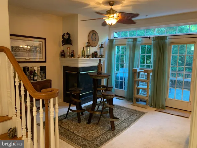 a view of a livingroom with furniture and window