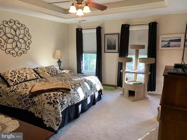 a bedroom with a bed and a walk in closet