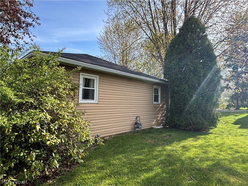 2421 Burbank Road Wooster, OH 44691 - Photo 8 of 23 View of property exterior with a yard