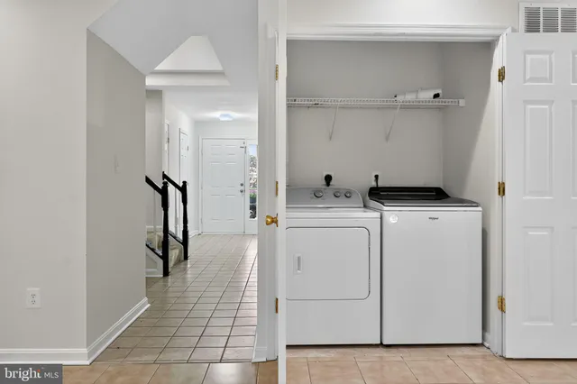 a room with dryer and washer