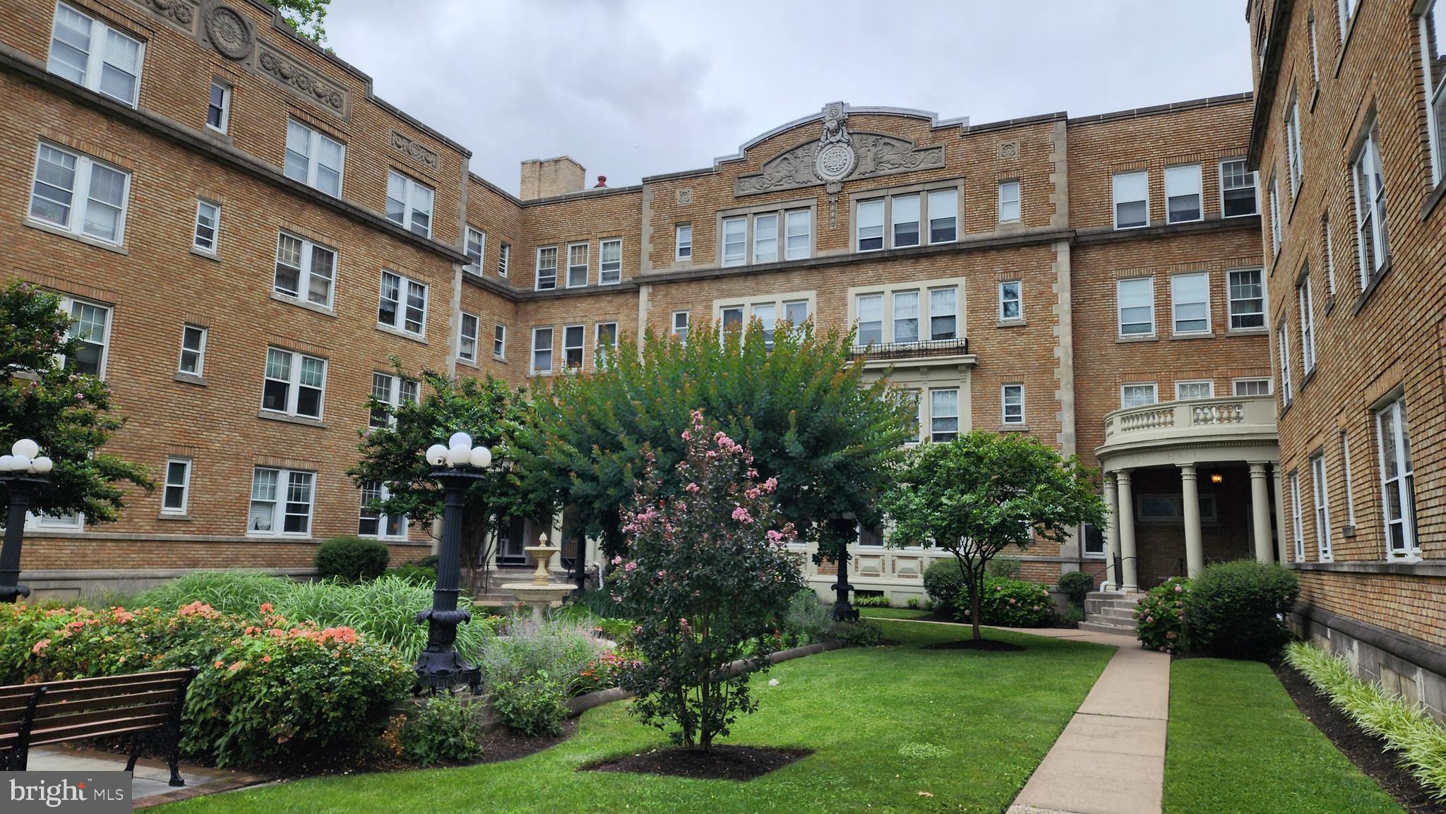 6655 McCallum Street, Unit 409 Philadelphia, PA 19119 - Photo 1 of 12 a front view of a building