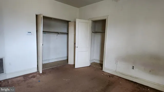 a bathroom with a sink and a window