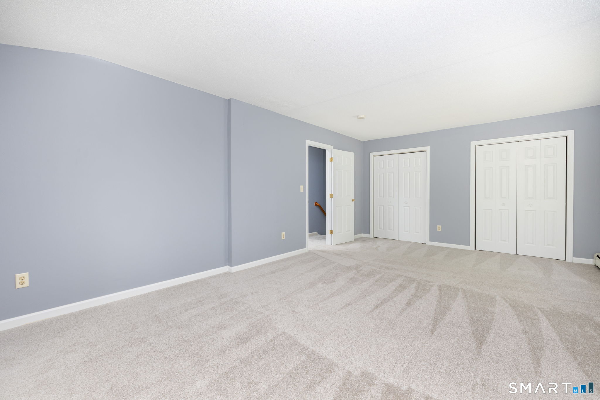 175 Vernon Street Manchester, CT 06042 - Photo 19 of 38 a view of an empty room with closet and a window