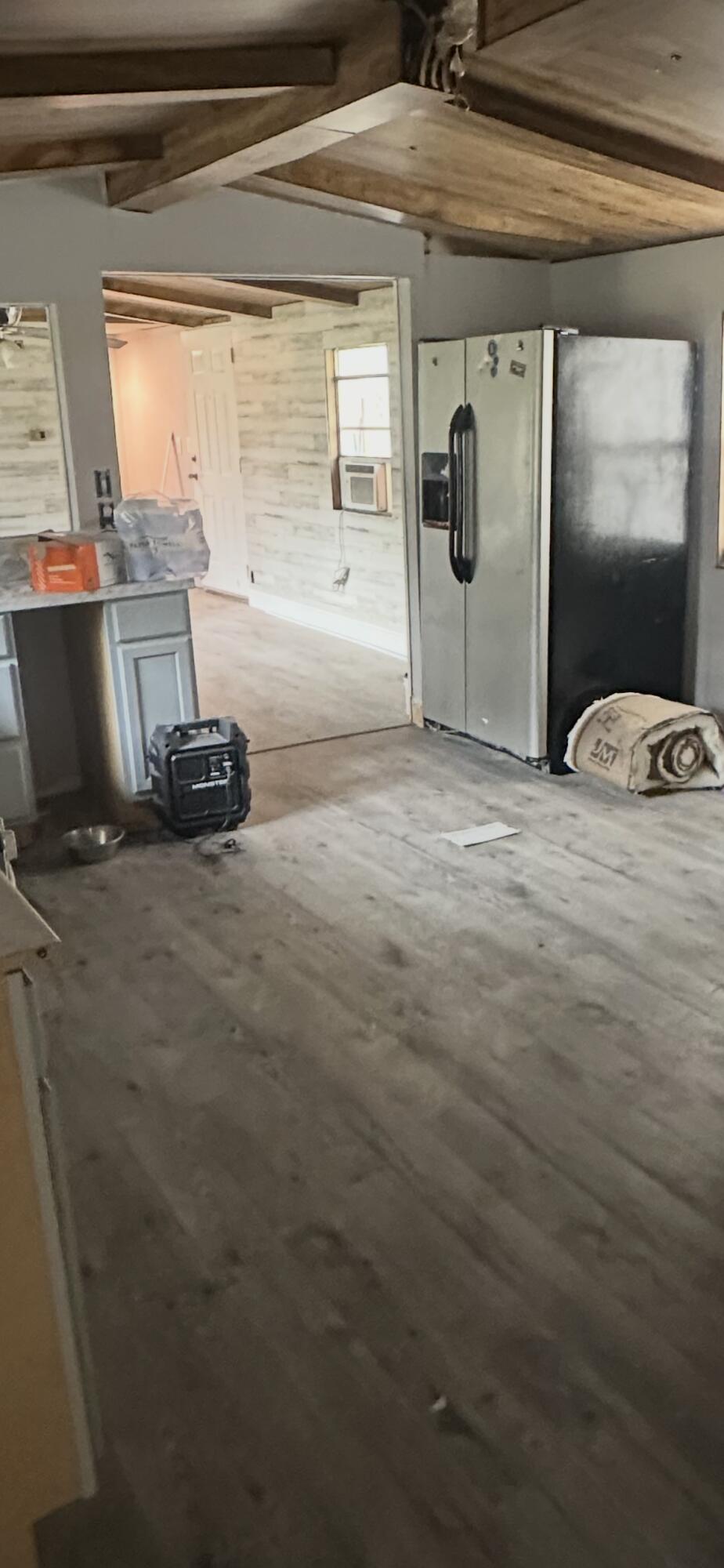 2984 B Goodman Hill Road Chipley, FL 32428 - Photo 6 of 14 a view of a livingroom with wooden floor and a window