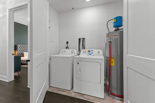a utility room with dryer and washer