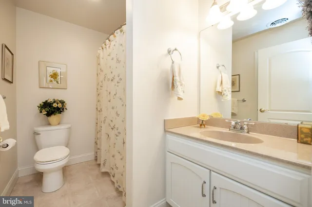 a bedroom with a bed and a cabinets