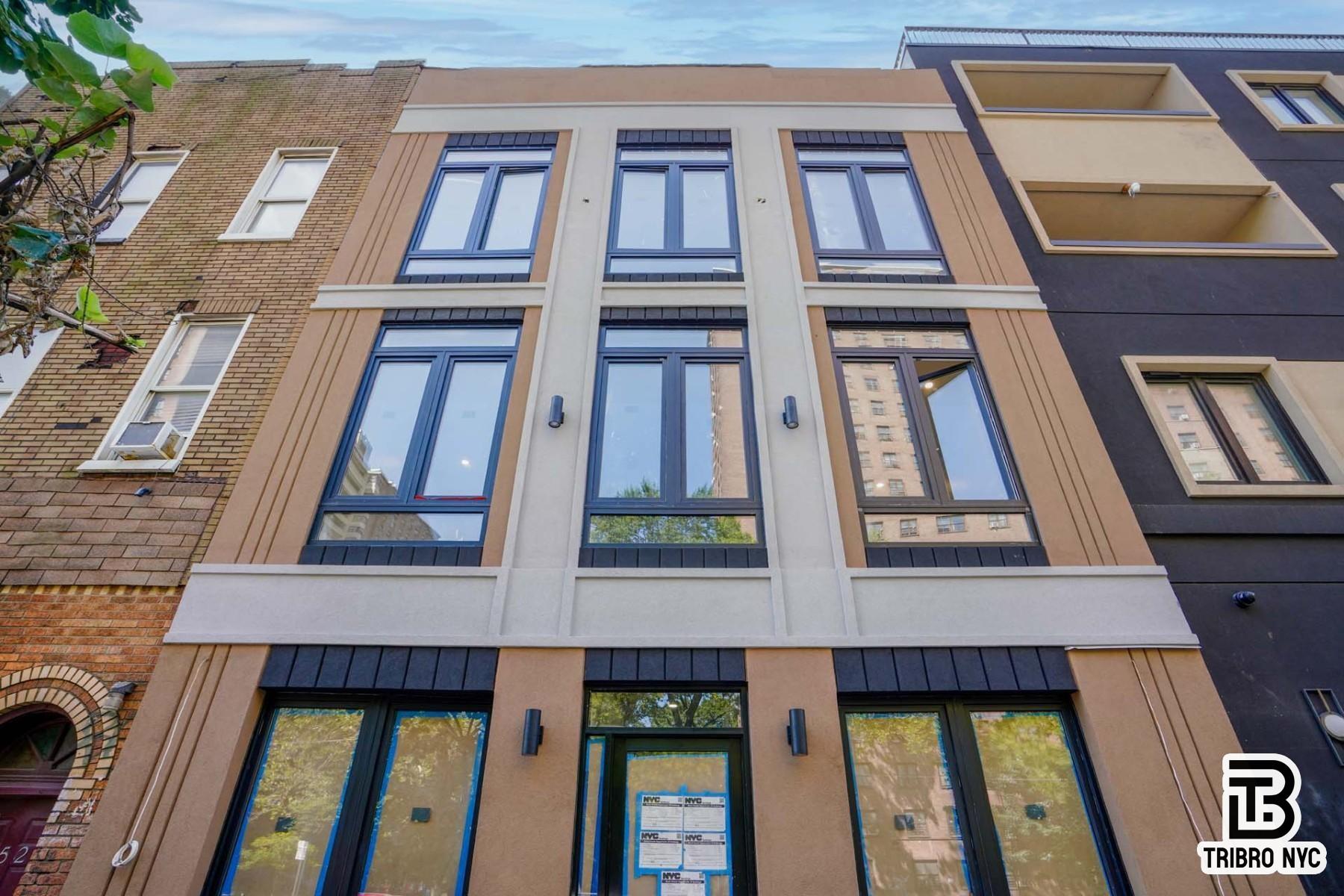 850 Flushing Avenue, Unit 3L Brooklyn, NY 11206 - Photo 8 of 8 a building with large windows