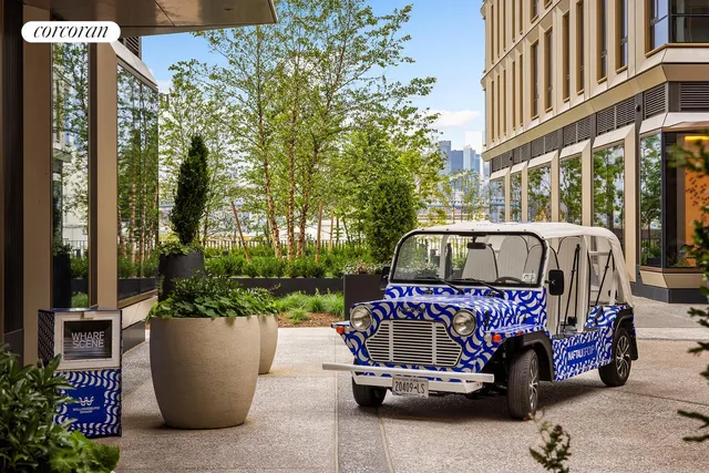 a view of a brick building with many windows
