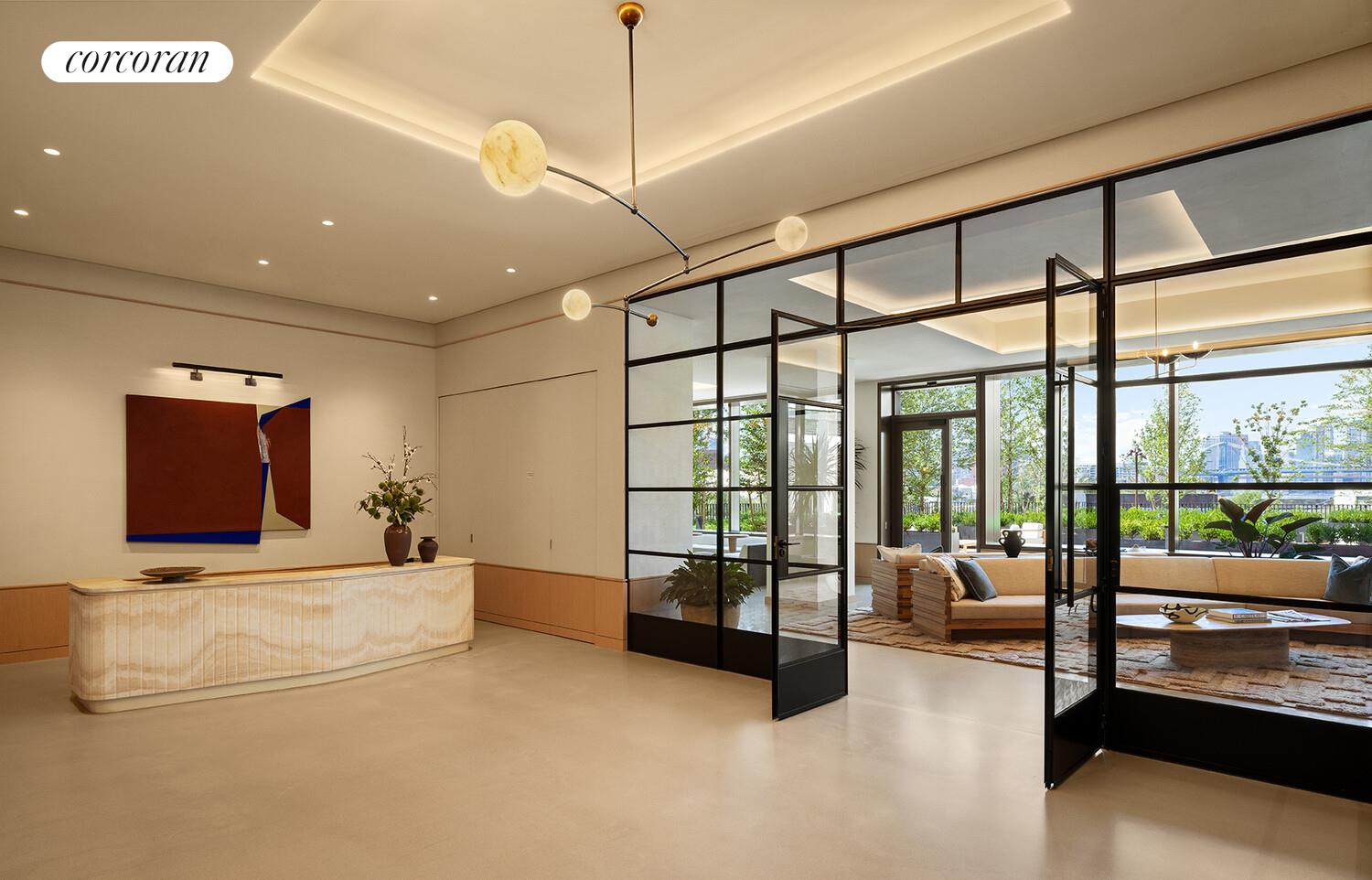 482 Kent Avenue, Unit PHB Brooklyn, NY 11249 - Photo 15 of 28 a living room with furniture and a flat screen tv