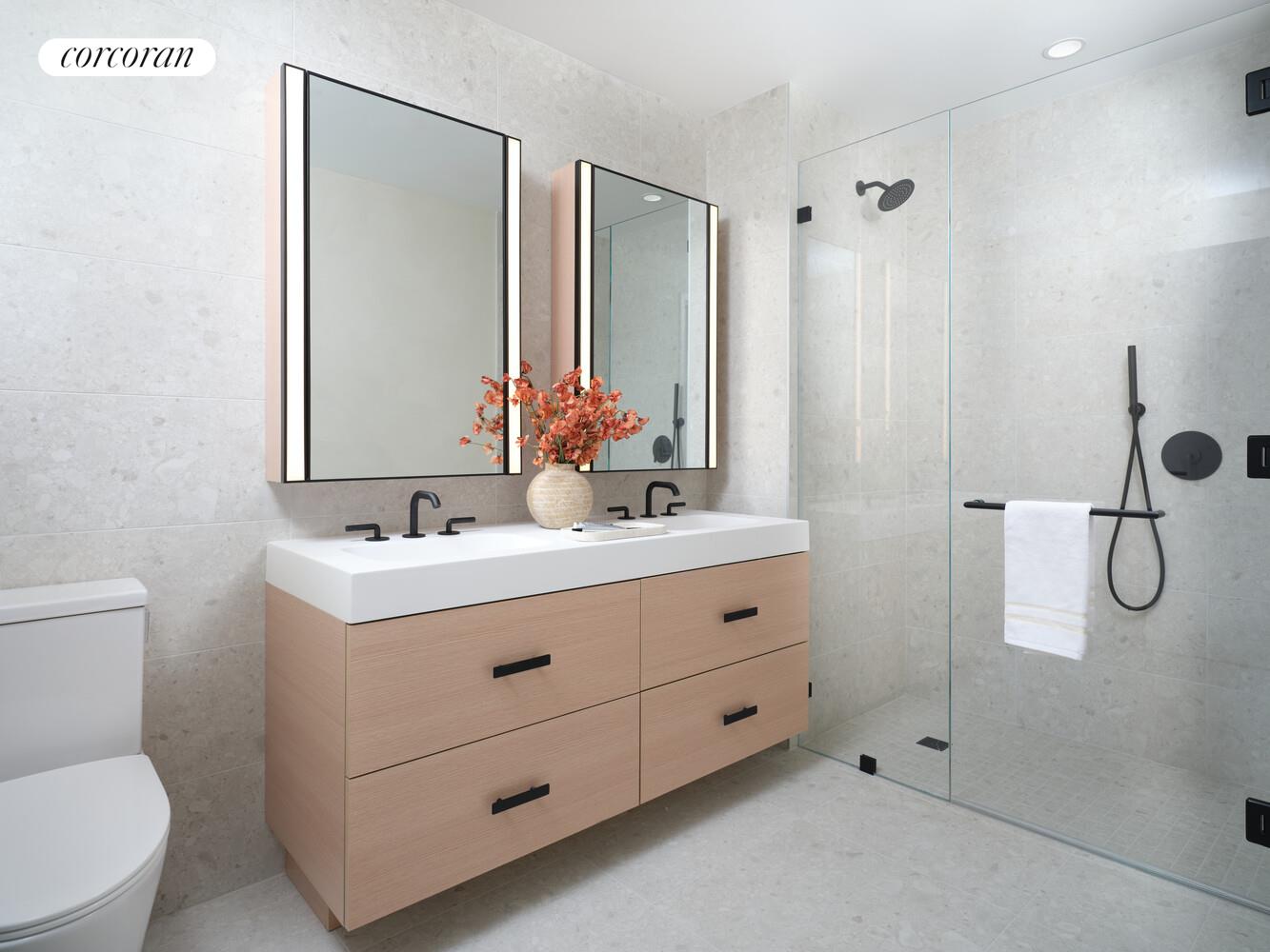 482 Kent Avenue, Unit PHB Brooklyn, NY 11249 - Photo 7 of 28 a bathroom with a sink a toilet and mirror