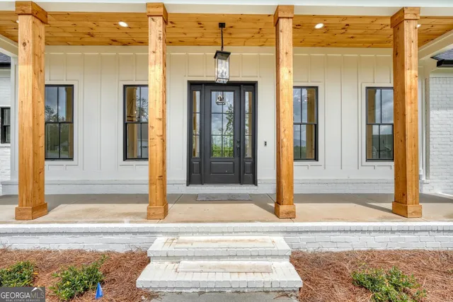 a view of a kitchen with a sink and a window