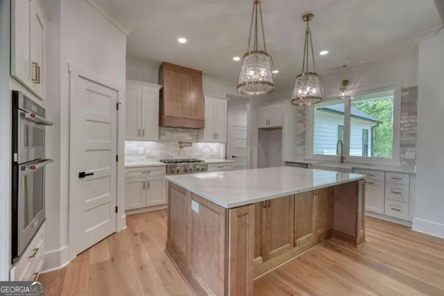 a view of outdoor space with wooden floor and city view