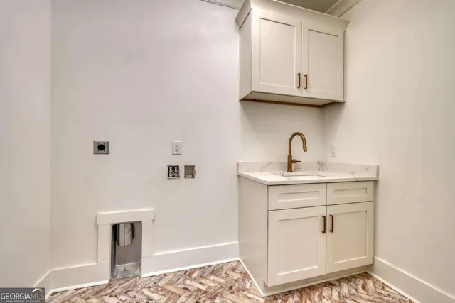 a bathroom with a toilet a sink and a mirror