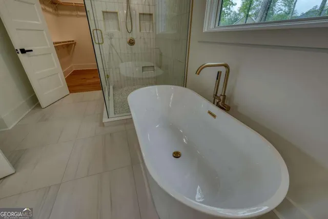 a living room with furniture fireplace and a flat screen tv