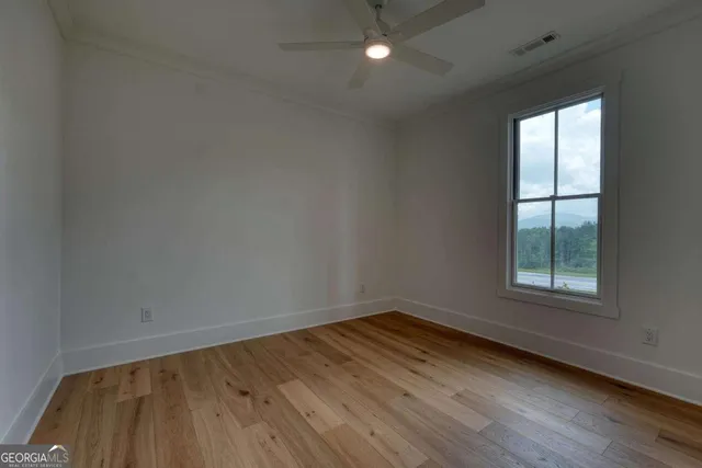 a media room with lots of white walls