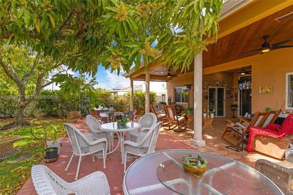 a outdoor space with lots of furniture and garden view
