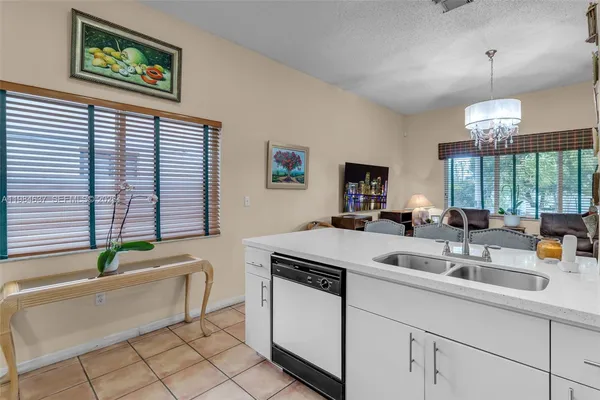 a dining room filled with furniture and window