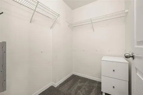a view of a room with racks on the wall