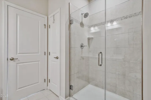 a bathroom with 2 sink and a mirror