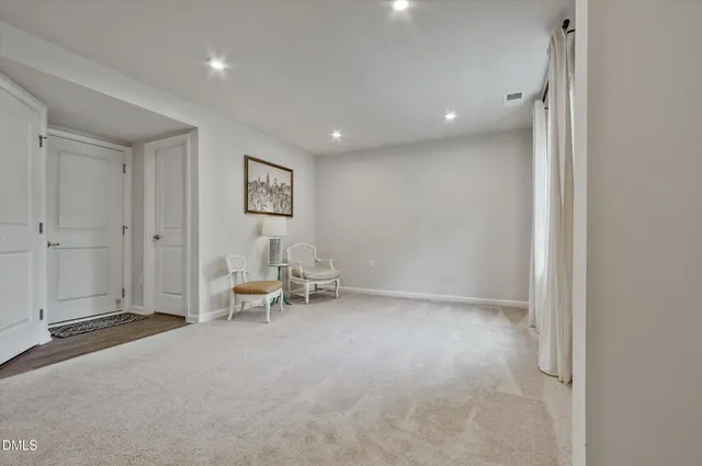 a view of a livingroom with lounge chair