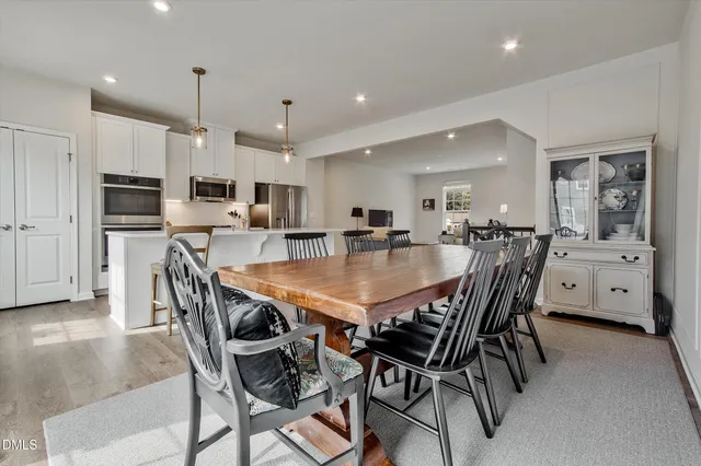 a view of a dining room and livingroom with furniture