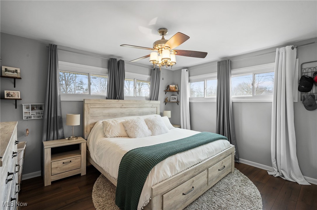 87 Kenridge Road Akron, OH 44333 - Photo 26 of 48 Bedroom with a ceiling fan, baseboards, and dark wood-style flooring