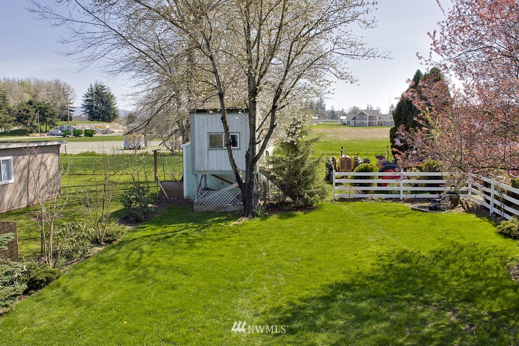 497 East Pole Road Lynden, WA 98264 - Photo 14 of 14 a view of outdoor space with deck and green space